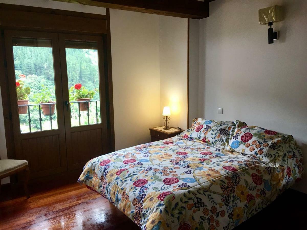 La Casuca De Pumarena Villa Bagian luar foto