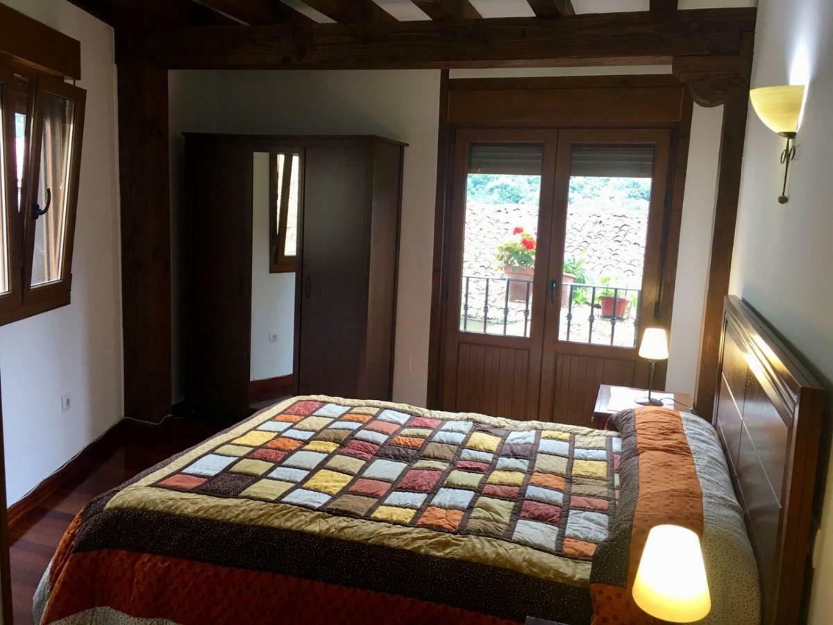 La Casuca De Pumarena Villa Bagian luar foto