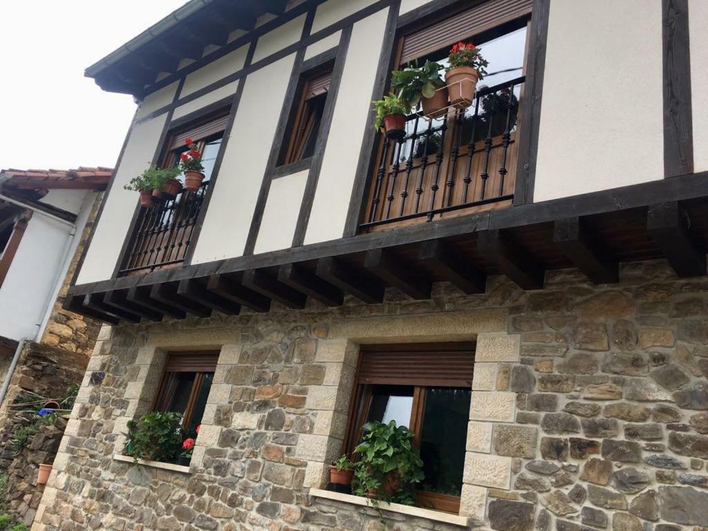La Casuca De Pumarena Villa Bagian luar foto